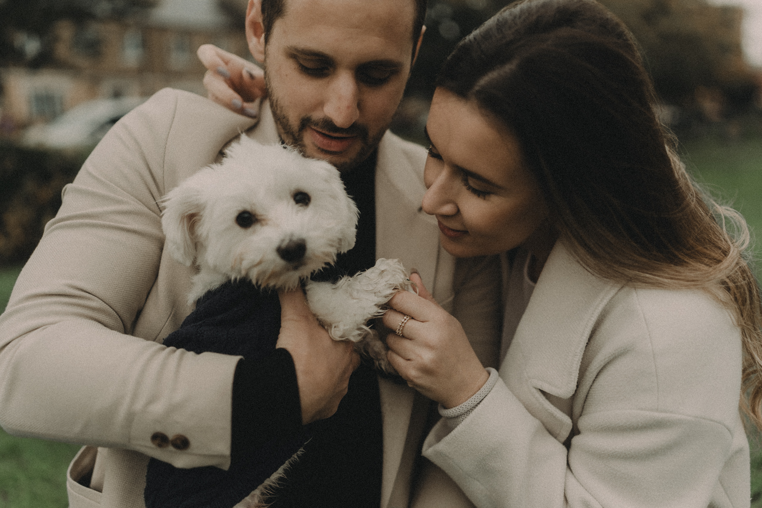 couple in London with their maltese dog